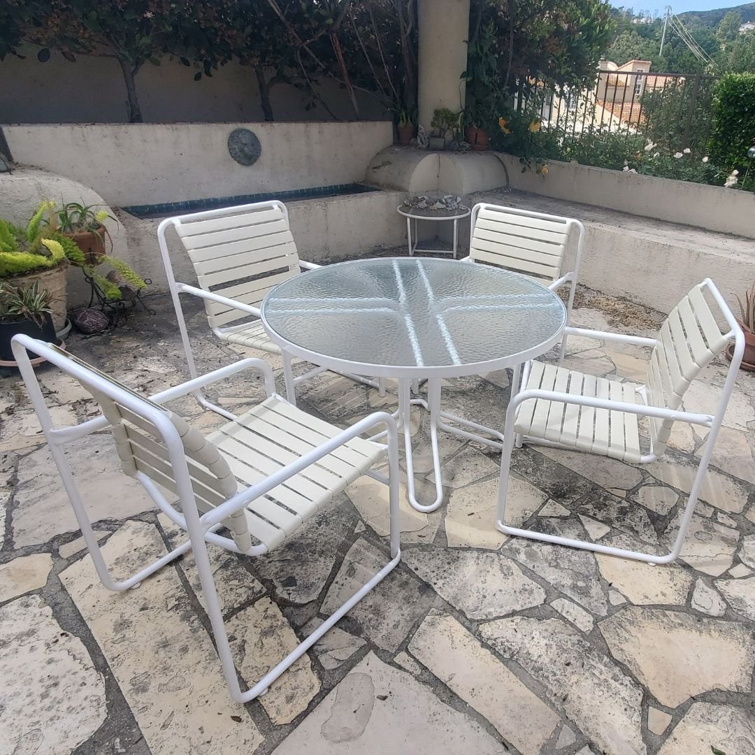 freshly restored patio set with a new acrylic table top new white powder coat paint and new off-white vinyl strap - Patio Guys