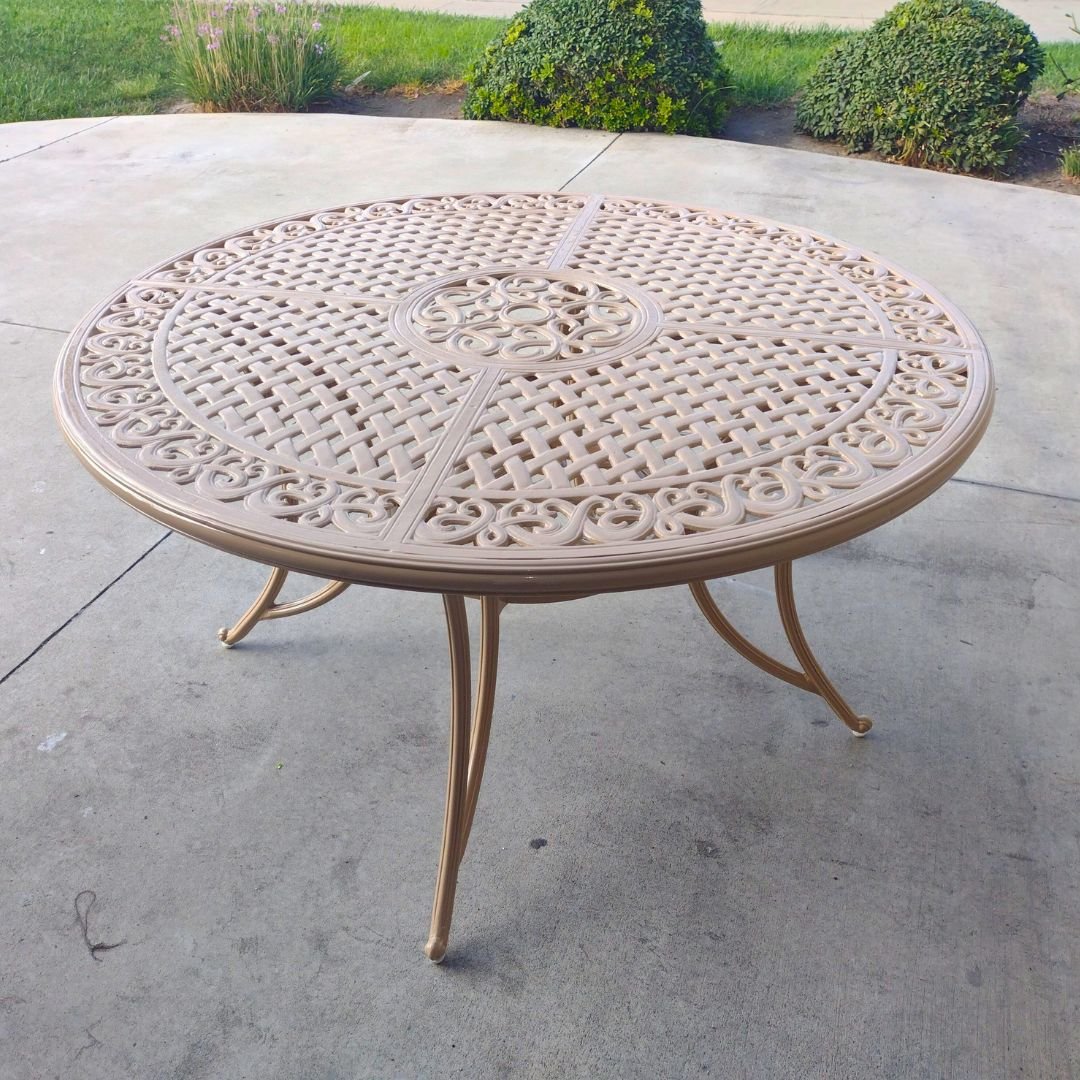 ornate, all-metal, outdoor table restored to like new state with fresh tan powder coat paint by patio guys