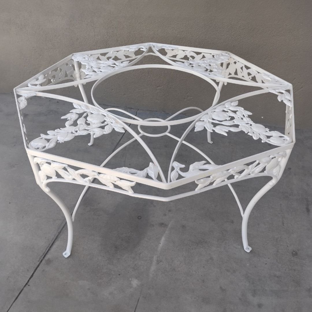 Newly powder coat painted, all-white, metal, outdoor patio table restored by patio guys