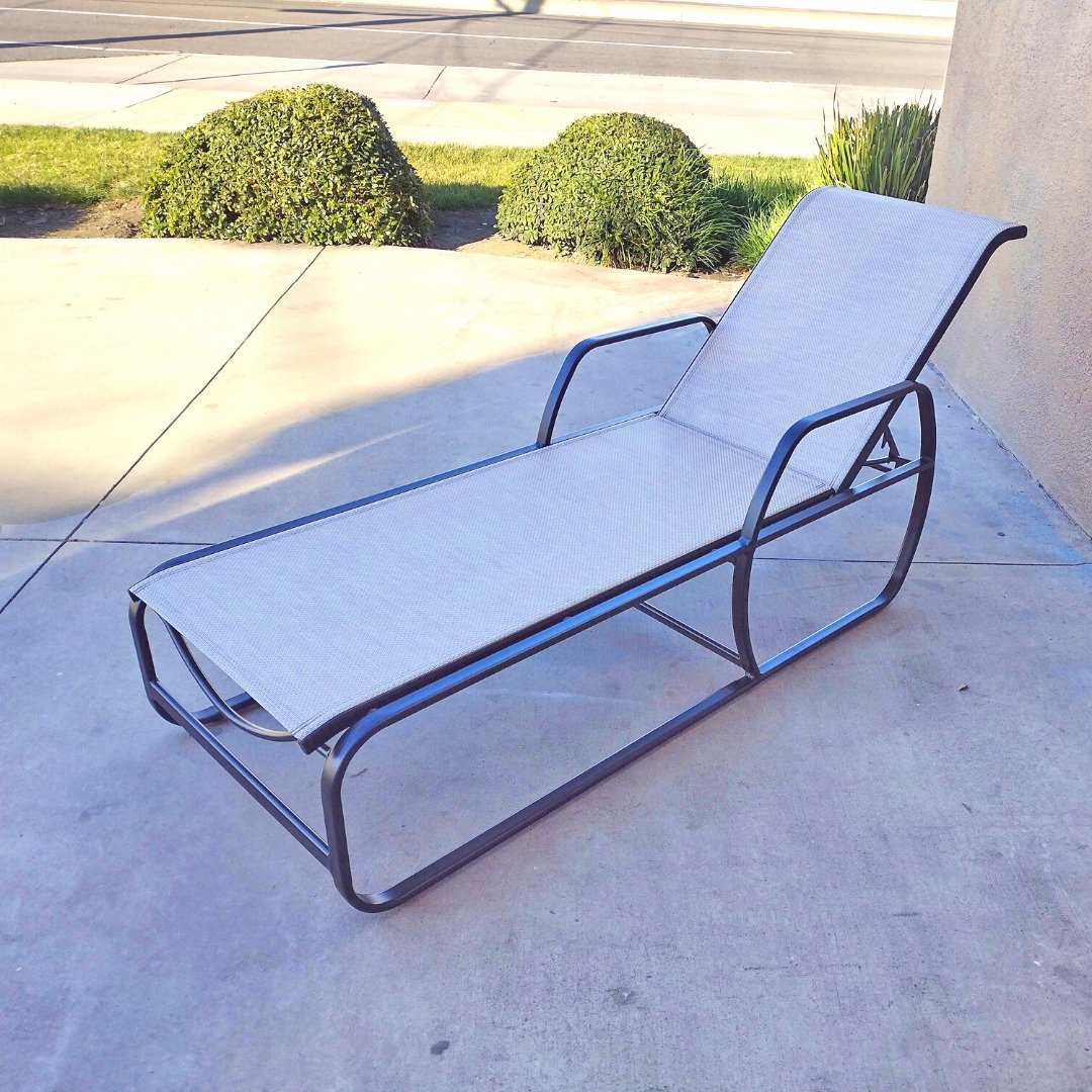 Brown Jordan, black, pool chaise lounge with custom cut tan sling after restoration by patio guys outdoor furniture refinishers