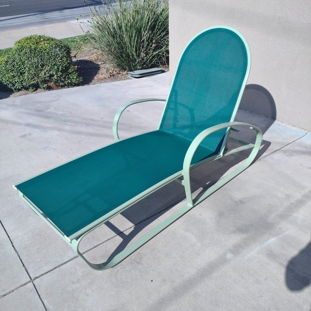 Unique light green pool chaise lounge with rounded back and dark green sling after full restoration by patio guys outdoor furniture refinishers