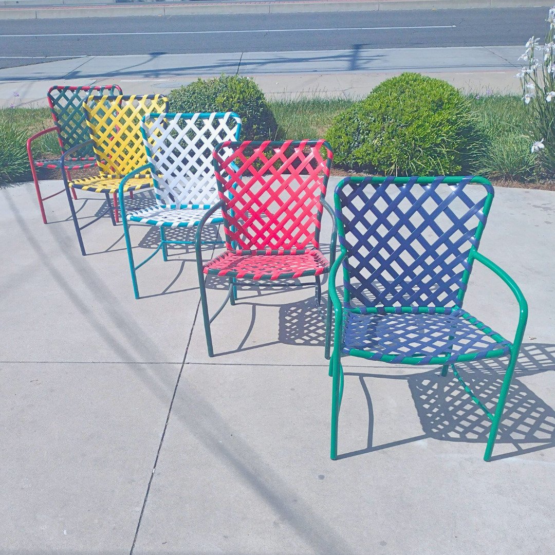 Colorful green, black, & blue Brown Jordan outdoor chairs with blue, red, white, yellow & green vinyl strap - patio guys