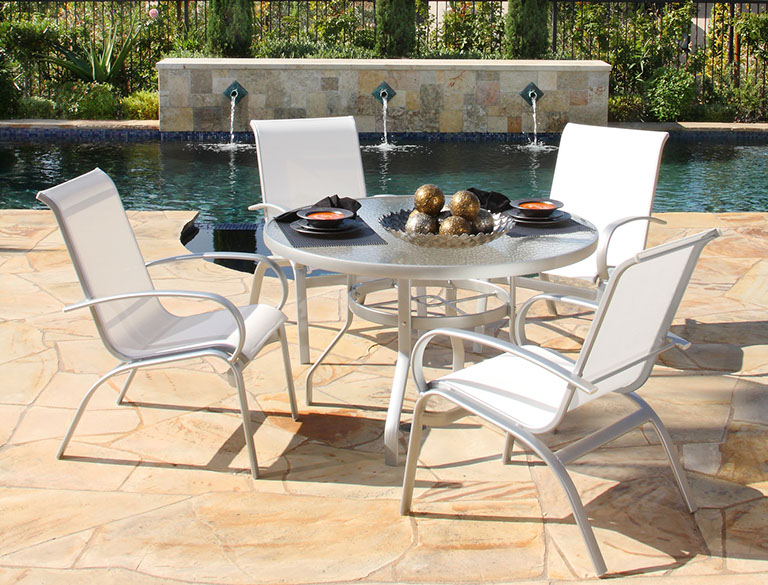 Hanamint luxury dining patio furniture set provided by Patio Guys