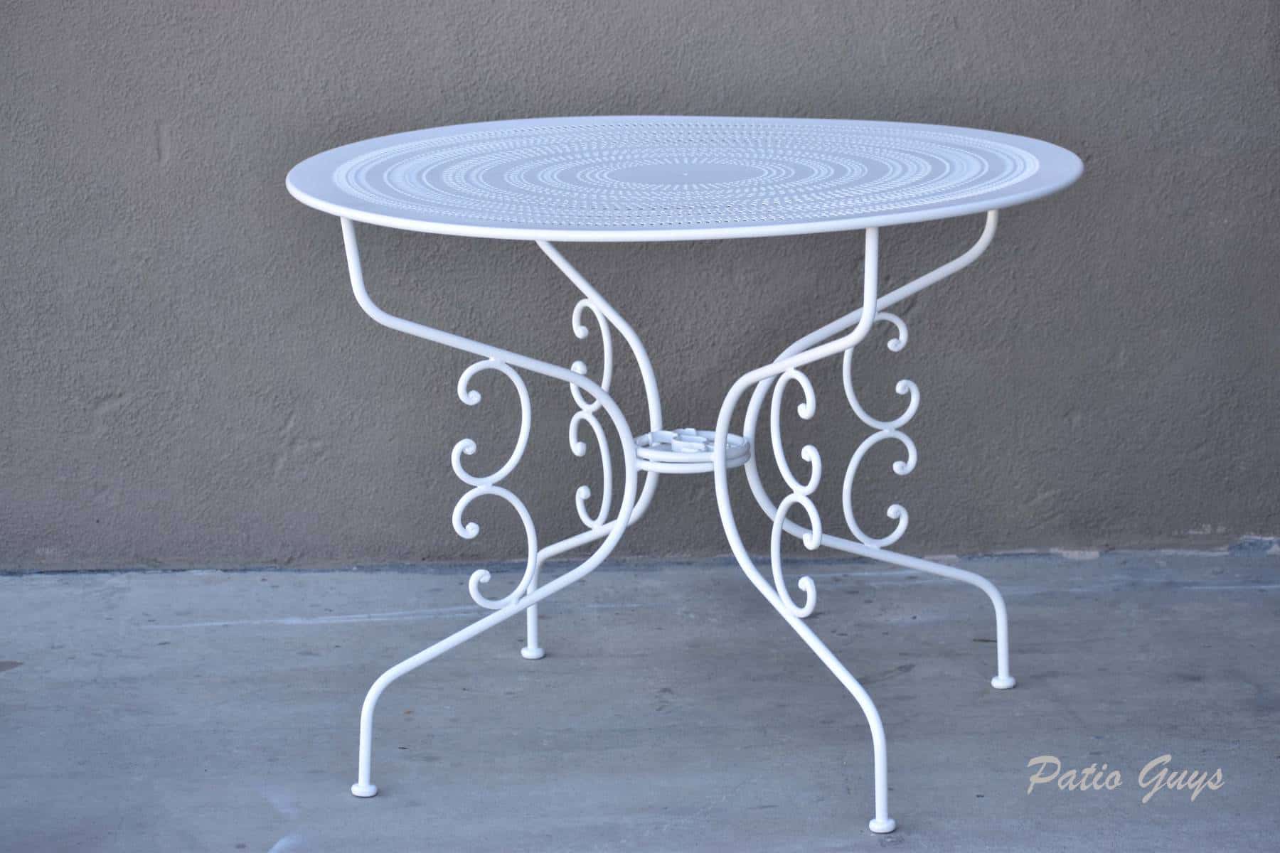 White outdoor wrought iron table