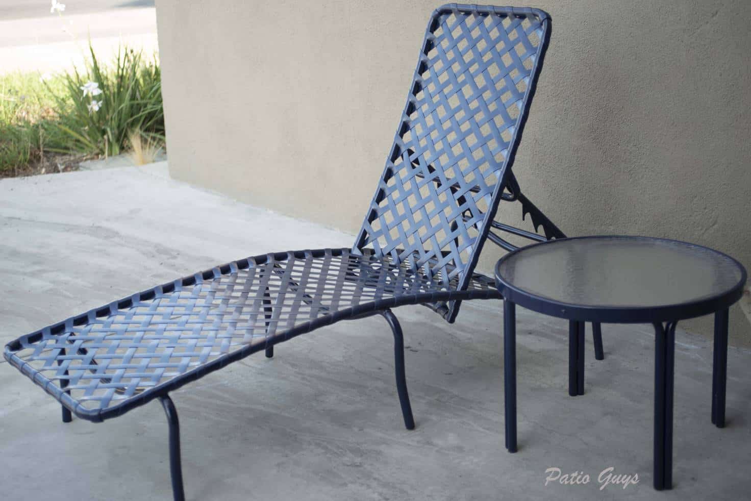 Navy blue chaise lounge with navy side table
