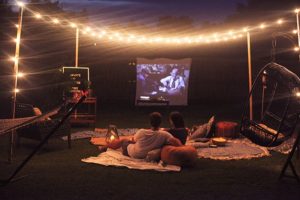Outdoor movie night backyard date idea